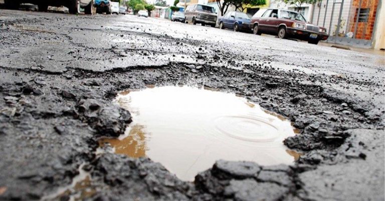 Lluvias Revelan Deficiencias en Pavimentación de Avenida Industrias